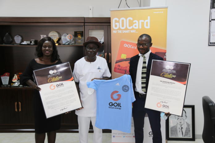 Mr. Kwame Osei-Prempeh (3rd right), receiving the citation from the U.C.C Law School Vice-President, Elizabeth Ehun, while Abdul Rahamann Ibrahim and Patrick Offei look on