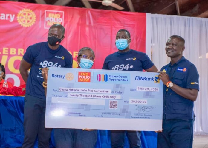 Nana Yaa Siriboe of Ghana National Polio Plus Committee receiving the cheque from Victor Yaw Asante, FBNBank Ghana MD/CEO. Looking on are Philip Afari and Isaac Asante Kwatia of FBNBank Ghana Limited