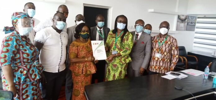 AGI chairperson, Mrs. Afua Gyafua Owusu-Akyaw, third from left, in a pose with the Vice Chancellor of KNUST, Professor (Mrs.) Rita Akosua Dickson, third from right